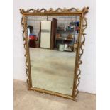 A large gilt mirror overall 120cm h x 80cm w