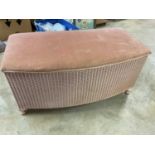 Lloyd Loom laundry basket, with upholstered seat lid.