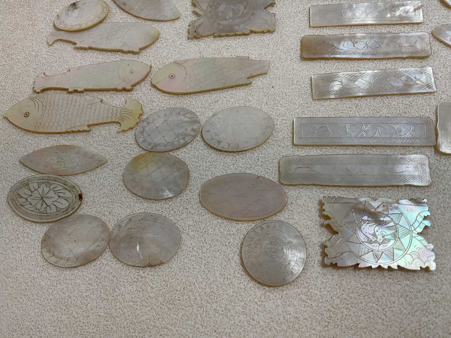 A small collection of 19th century Chinese mother of pearl gaming counters. - Image 3 of 3