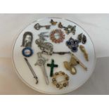 A quantity of silver and costume jewellery including a silver Charles Horner brooch, a silver golf