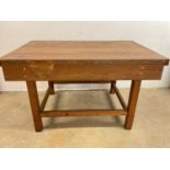 Large solid work bench with pitch pine base and hardwood top, height 83cm, width 145cm, depth 96cm.