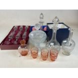 A collection of glass including boxed champagne glasses, ship's decanter, further decanters, etc.