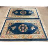 A pair of Chinese superwash rugs, 170 x 92cm.Dimensions: 170cm x 92cm