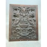 A well carved Victorian oak panel, 45 x 35 cm.