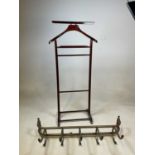 A wooden freestanding valet suit stand, and a brass five hook wall coat rack (2)