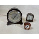 A vintage bakelite Enfield mantel clock, a Smith's electric bakelite mantel clock and one other.