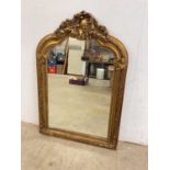 A large gilt framed decorative mirror, height 118cm height, width 80cm.