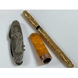 A vintage pocket knife and corkscrew marked 'Champagne Jules Mumm & Co - Reims', a yellow metal Swan