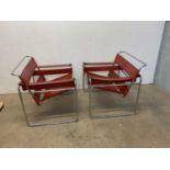 After Marcel Breuer; a pair of Vassily leather and tubular chairs