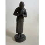 AFTER A VIBERT; a bronzed metal figure of a Dutch woman with head bowed in prayer, signature to