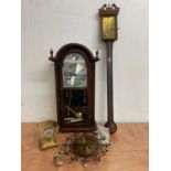 A reproduction stick barometer by Thomas Wright, a President wall clock, a Junghams wall clock, a