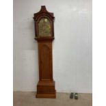 A 19th century oak longcase clock with brass face inscribed Barthrop, height 217cm, width 49cm.