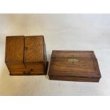 A 19th century rosewood and brass inlaid writing slope and a circa 1910 oak stationery cabinet, both