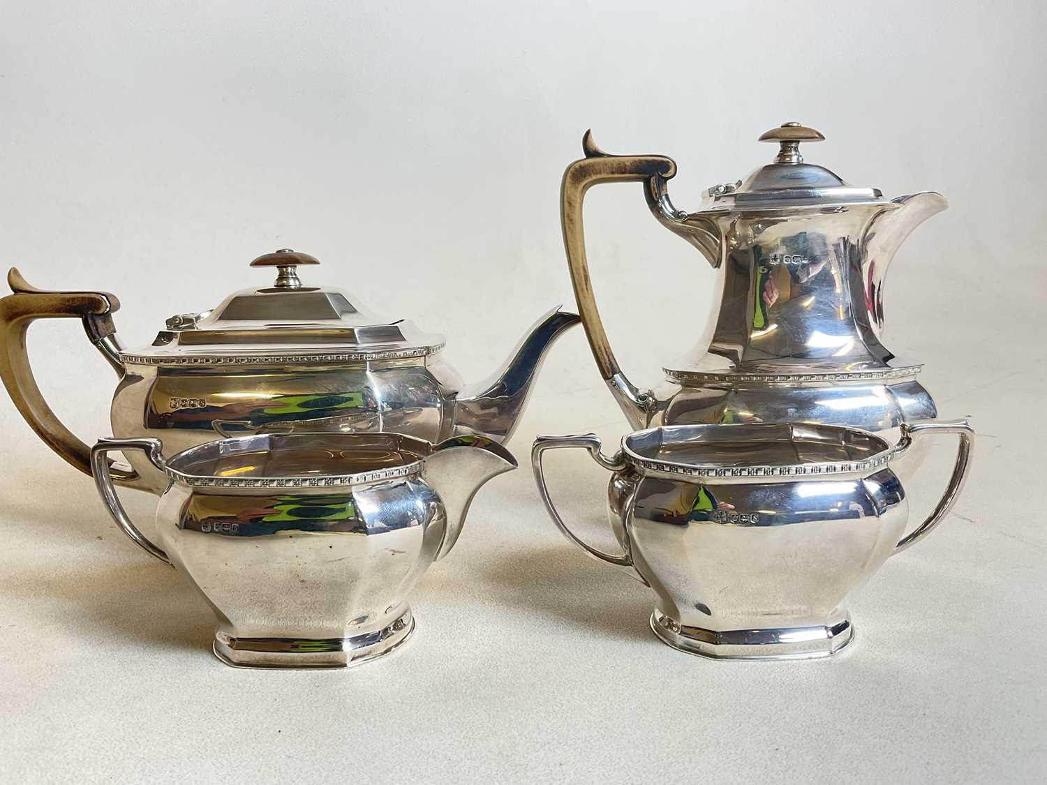 COOPER BROS AND SONS; a hallmarked silver four piece tea set comprising teapot, water jug, sugar - Image 6 of 17