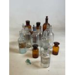 A collection of apothecary bottles, tallest 31cm