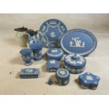 A collection of Wedgwood Jasperware including trinket boxes, vases and plates, and a Victorian