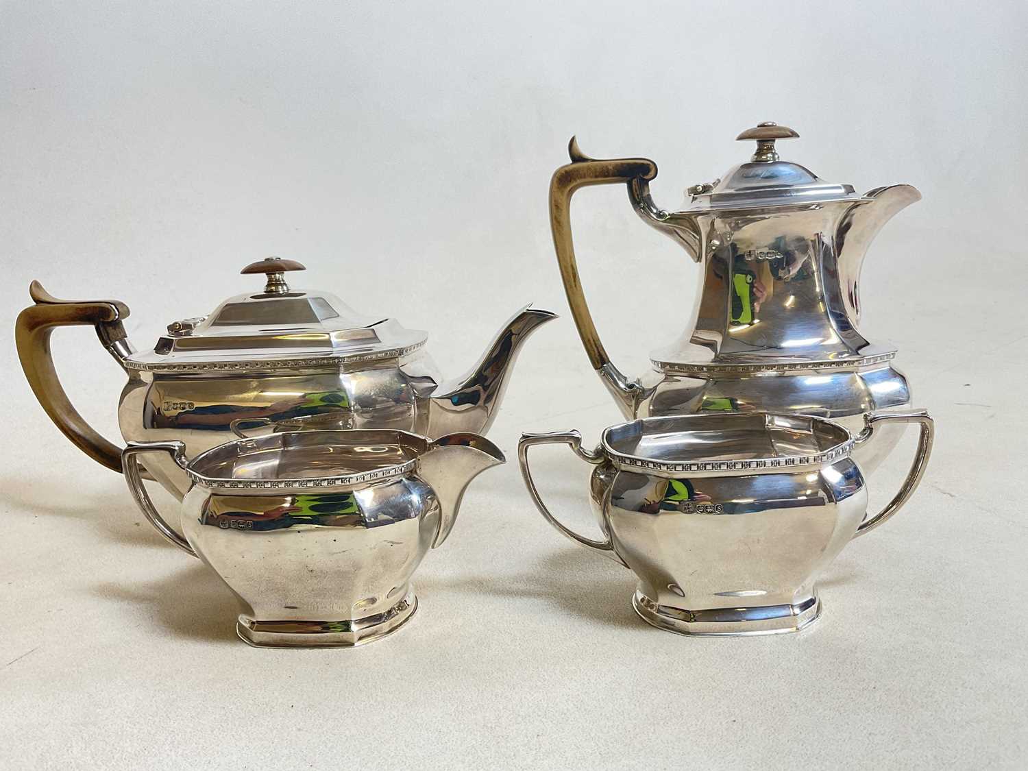 COOPER BROS AND SONS; a hallmarked silver four piece tea set comprising teapot, water jug, sugar - Image 3 of 17