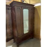 An early 20th century single mirror door wardrobe with fitted interior, height 207cm, width 120cm.