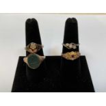 A 15ct gold and black enamelled mourning ring, size O1/2, 2.6g and three further rings (4)