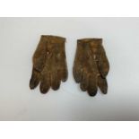 A pair of 19th century child's leather gloves, length 13cm.