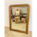 A late 19th/early 20th century gilt painted overmantel mirror, height 124cm, width 90cm.