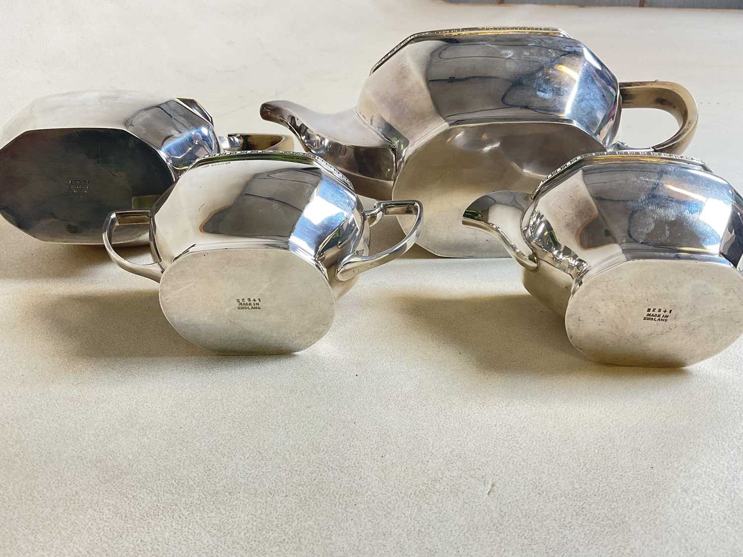 COOPER BROS AND SONS; a hallmarked silver four piece tea set comprising teapot, water jug, sugar - Image 12 of 17