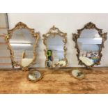 Five reproduction gilt framed mirrors.