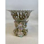 A Von Schierholz porcelain figural comport centrepiece, height 30cm.