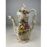 CAPODIMONTE; a large floral encrusted ewer, height 49cm.