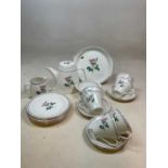 A vintage Norwegian Figgjo Flint teaset for six, decorated with pink roses
