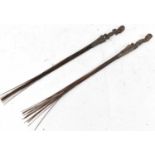 Two Luba, Democratic Republic of Congo, figural carved fly whisks, length approx 74cm.Provenance: