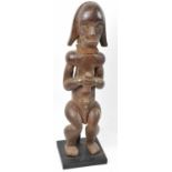 A Fang, Gabon, standing figure presented on contemporary plinth, left leg af, height 61cmProvenance:
