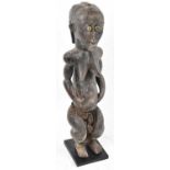 A Fang, Gabon, standing figure presented on contemporary stand, height 63cm.Provenance: This
