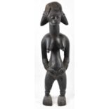 A Baule, Ivory Coast, large standing figure, height 89cm.Provenance: This collection has come to