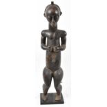 A Fang, Gabon, standing figure mounted on a contemporary stand, height 82cm.Provenance: This