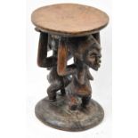 A Luba, Democratic Republic of Congo, double figurative stool, height 37cm.Provenance: This