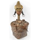Kota reliquary figure, Gabon, applied with brass and copper and set into a woven basket, height