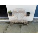 A modern white painted wirework garden planter, height 99cm, width 124cm.