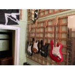 Four modern electric guitars, including Encore and AcePro examples (4)