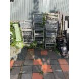 Fourteen galvanised milk crates (14)