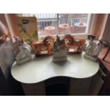 A collection of 19th century and later Staffordshire figures, including a pair of lions, and three