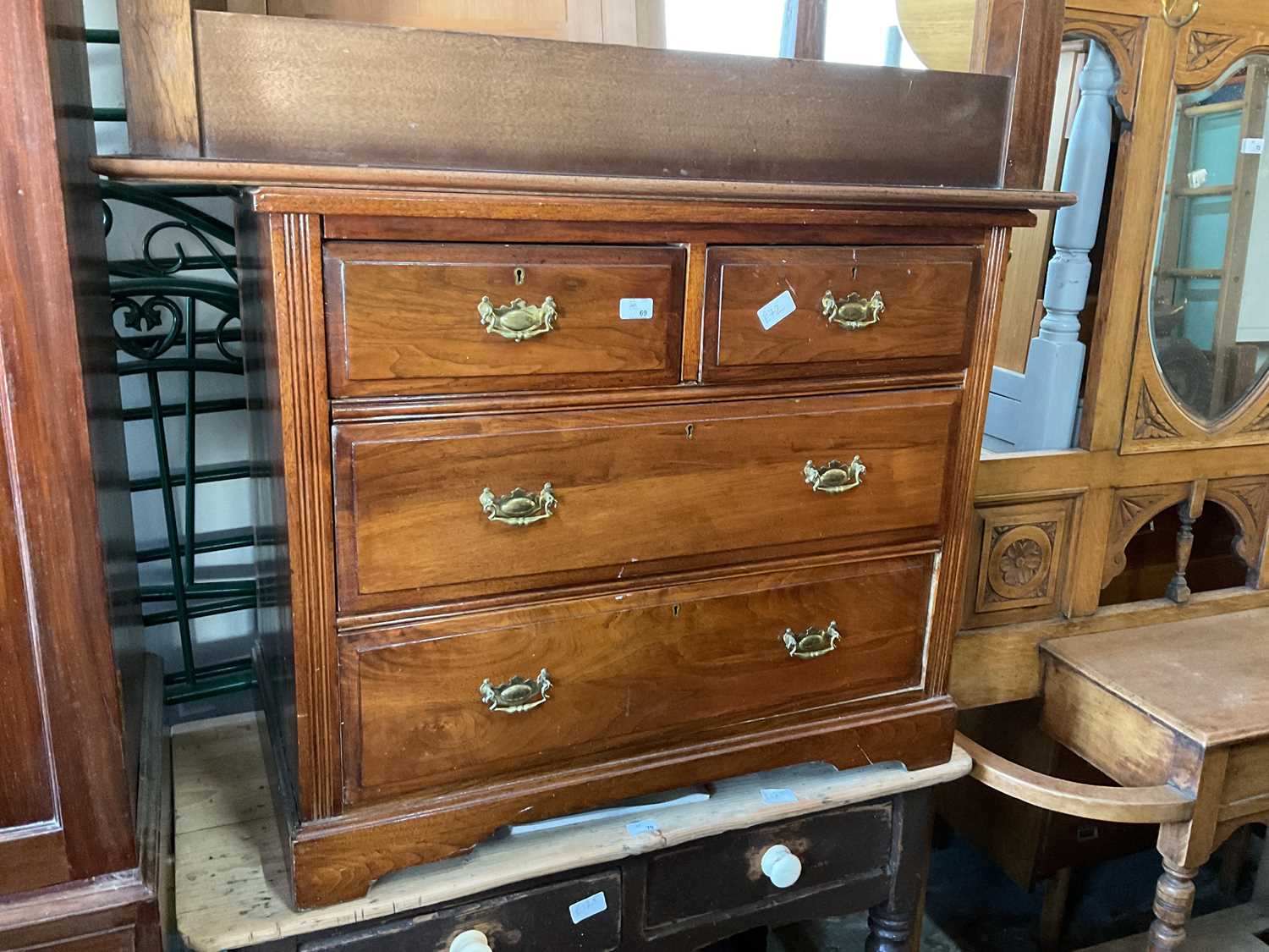 An early 20th century chest of two short over two long drawers, on bracket feet, width 91cm, depth