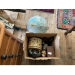 A mixed lot of assorted collectors' items to include a vintage globe, advertising tins, a Tetley