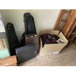 A collection of instrument cases/bags, hard and soft.
