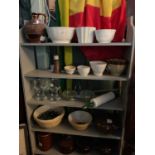 A collection of kitchenalia and assorted sundry items to include various jelly moulds, mixing bowls,