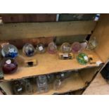 A collection of assorted glass and ceramics to include an assortment of paperweights, a decanter,