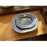 A collection of early 20th century and later blue and white meat plates, dinner and side plates