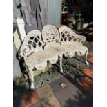 A white painted in the style of Coalbrookdale cast metal three seater garden bench (af)Condition