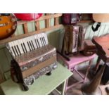 Two piano accordions, including an Firotti example, also an Empress concertina (3)