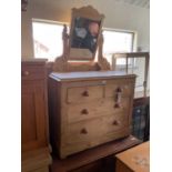 An old pine mirror back dressing table with an assortment of two short over two drawers, on plinth